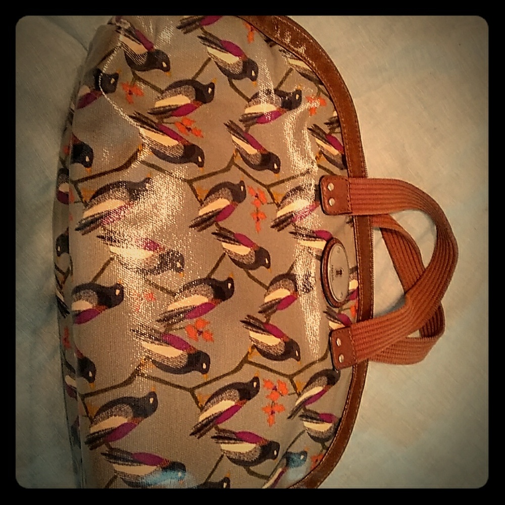 Fossil handbag with birds